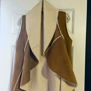 Faux suede shearling draped vest.